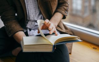 A man reading a book.