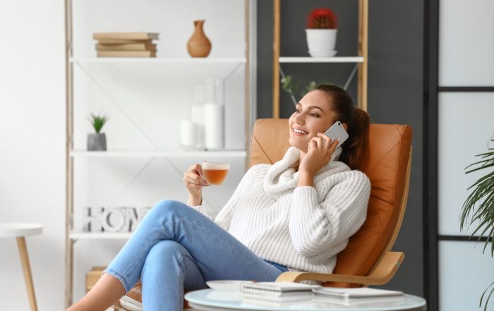 A woman talking on the phone.