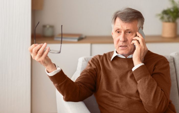 A man talking on a mobile.