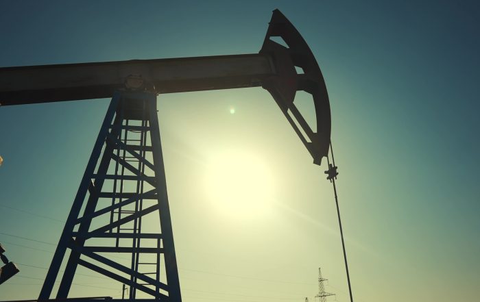A silhouette of an oil pump.
