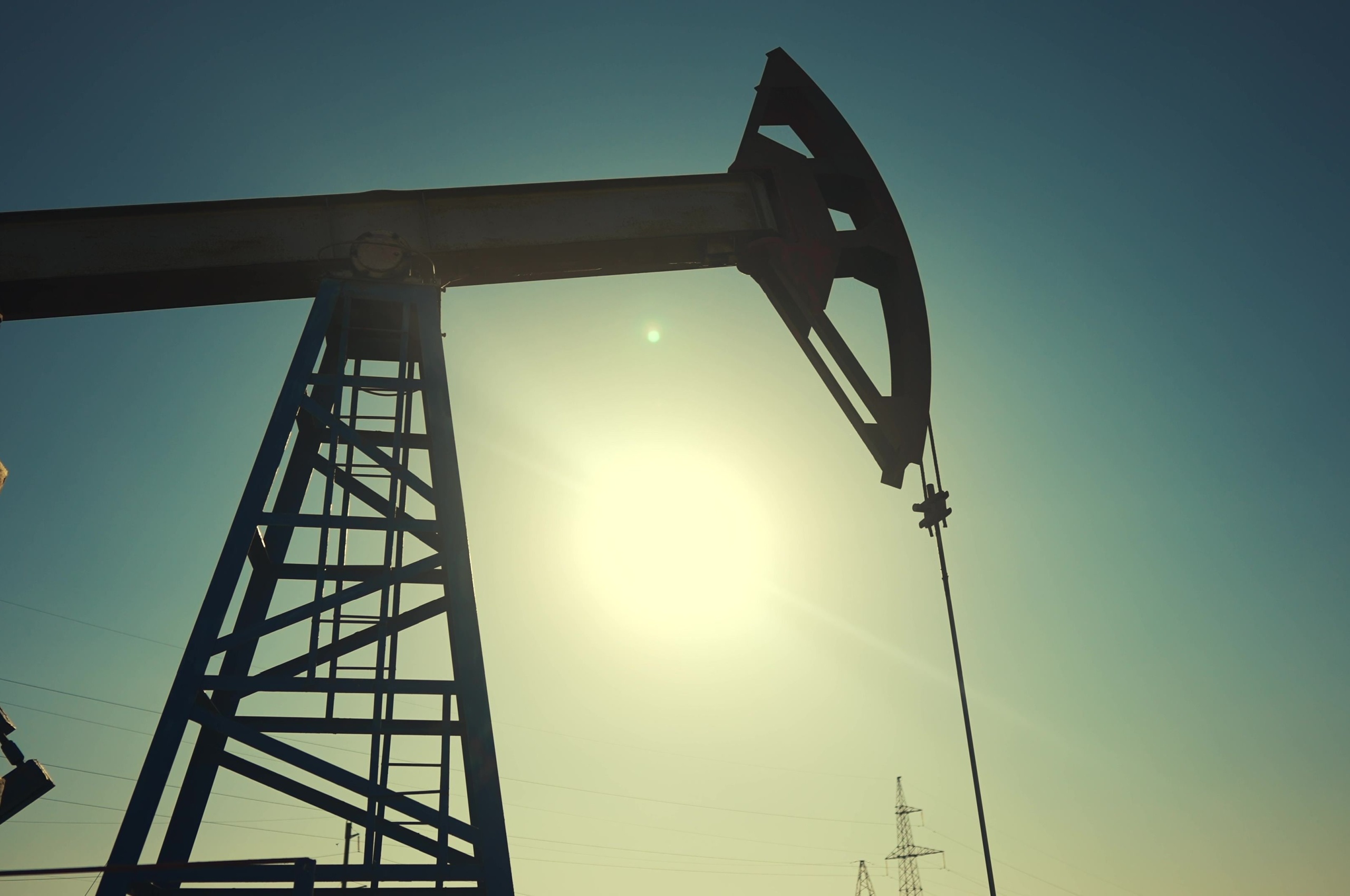 A silhouette of an oil pump.