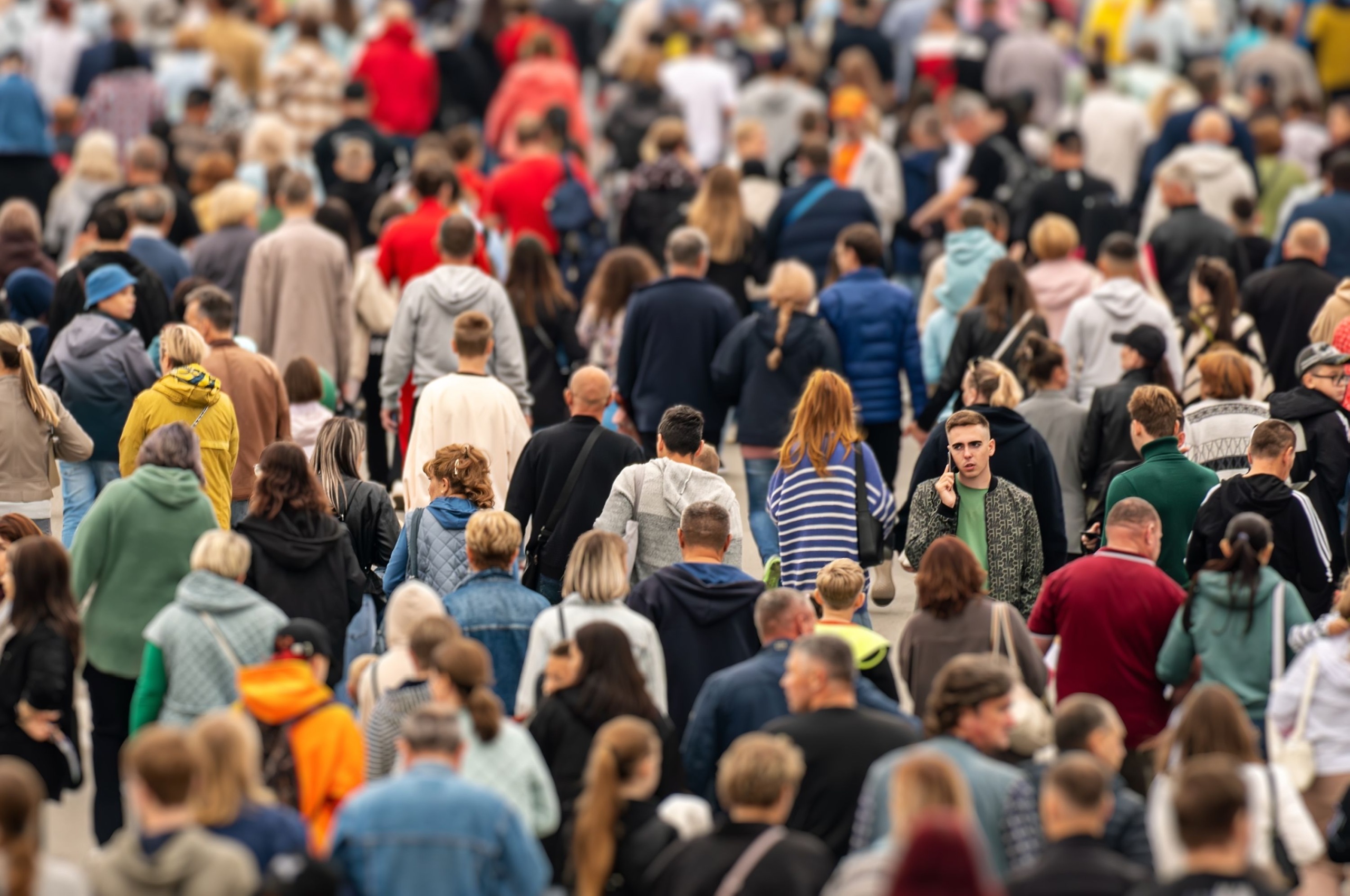 A crowd of people walking.